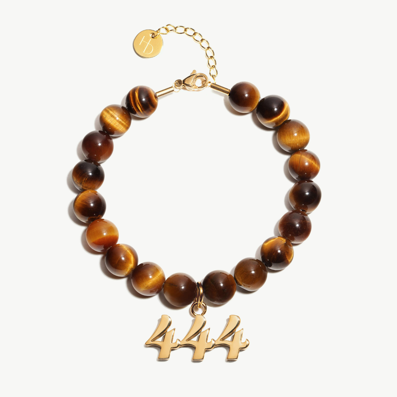 444 Tigers Eye beaded bracelet with adjustable clasp closure. 444 Gold Charm