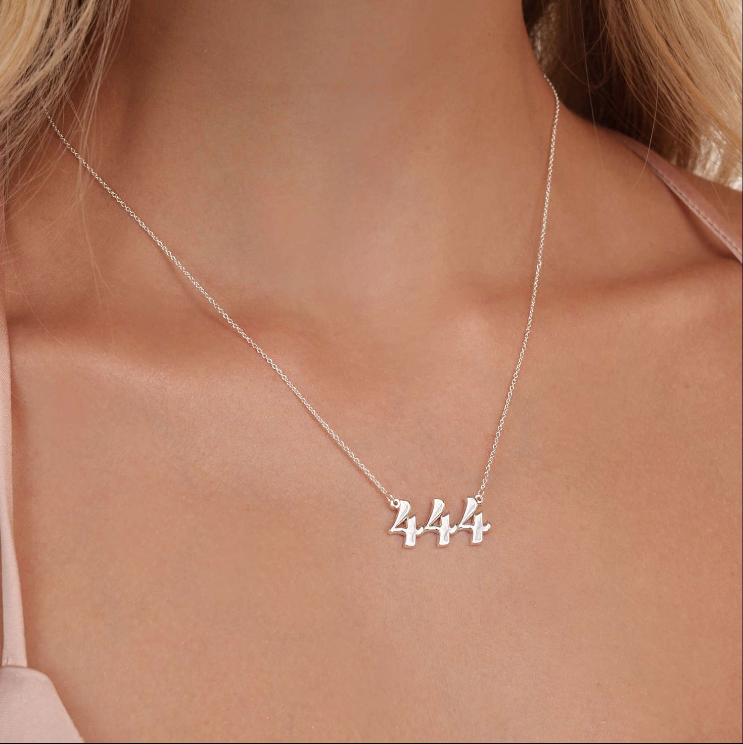 angel number 444 necklace silver pendant on model