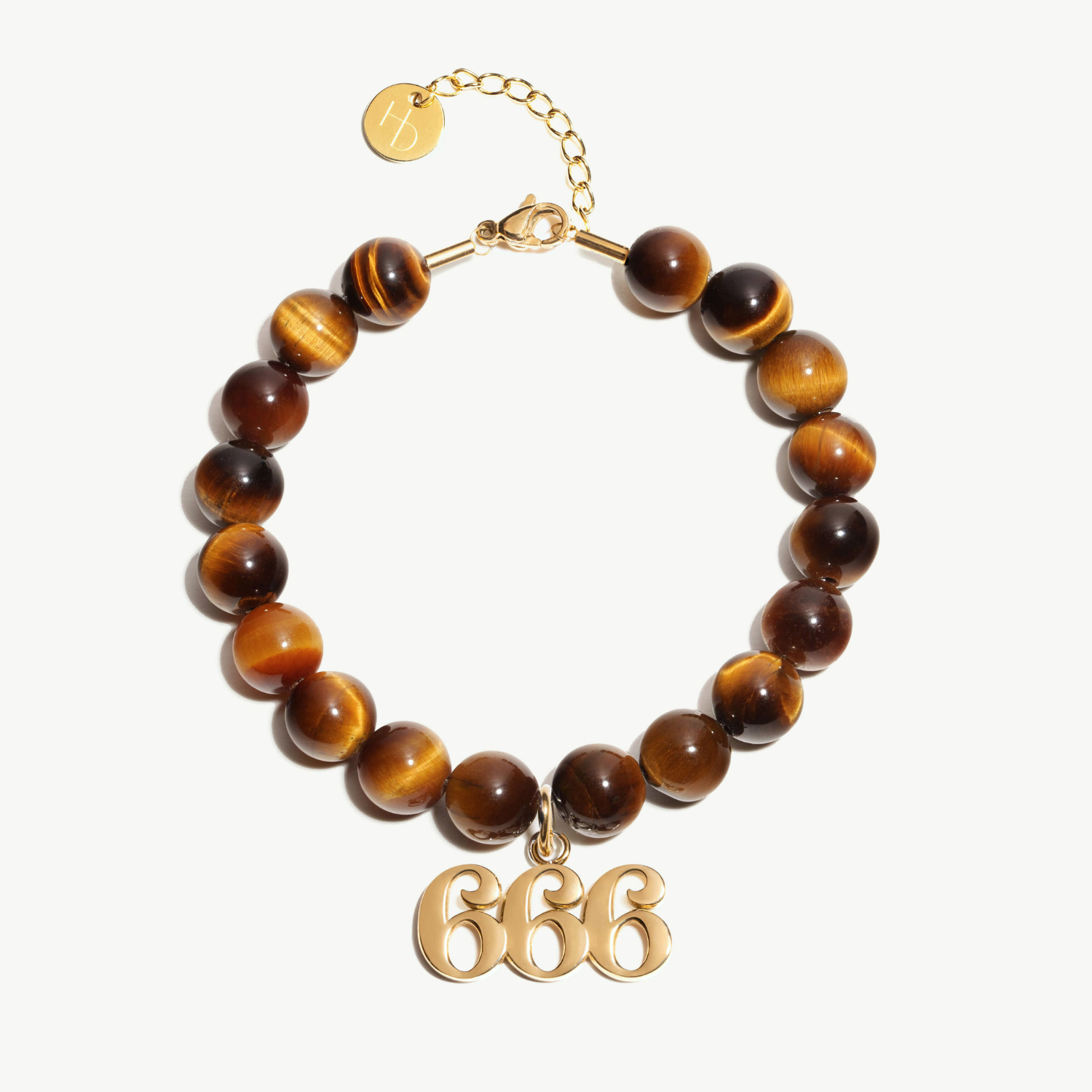666 Tigers Eye beaded bracelet with adjustable clasp closure. 666 Gold Charm