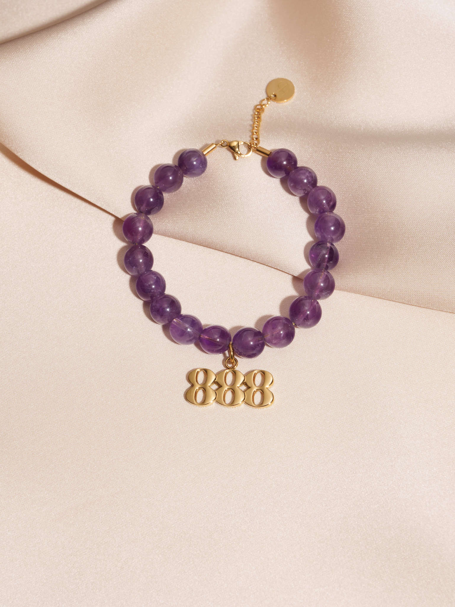 888 Amethyst Gold Charm Bracelet