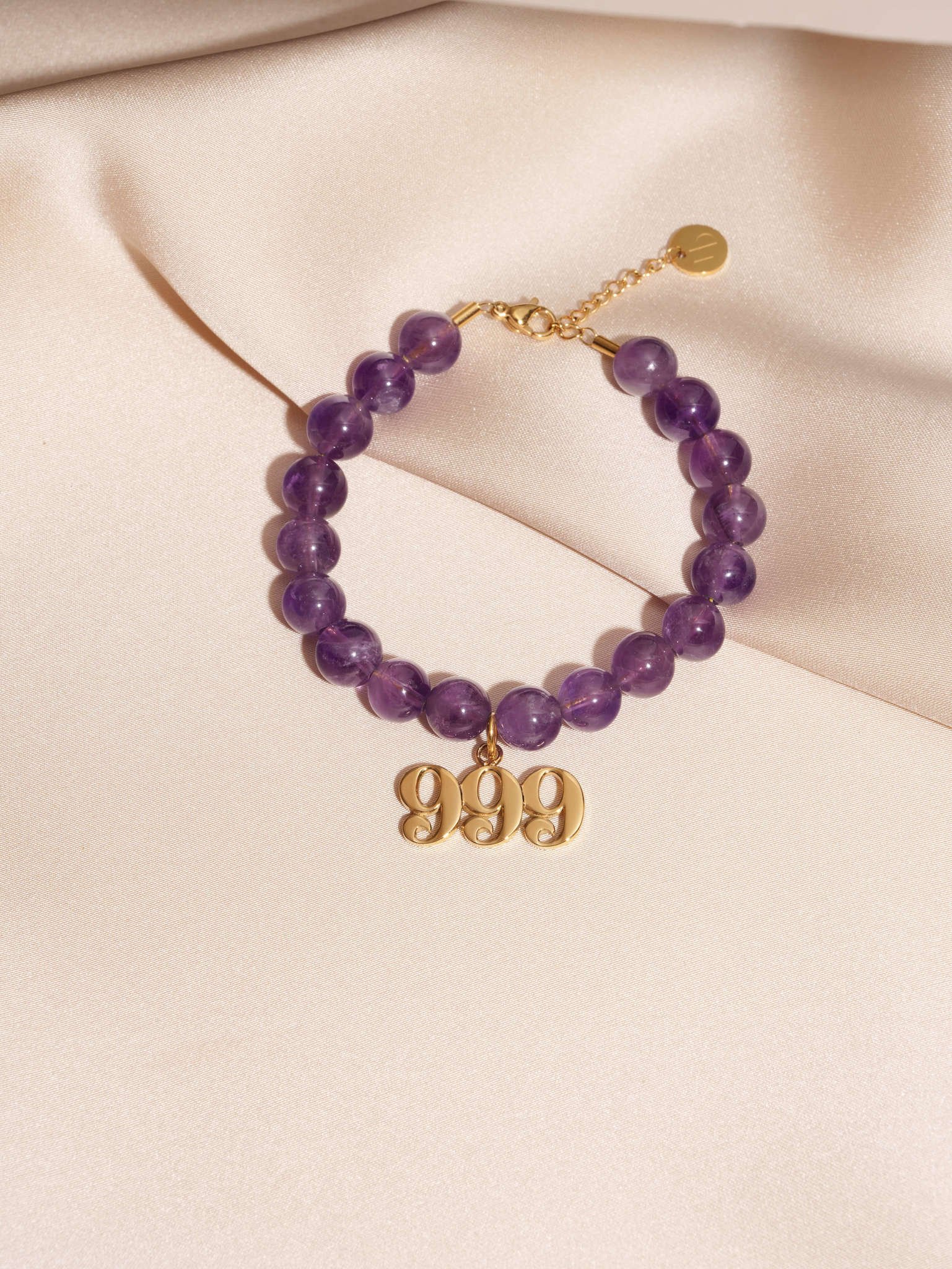999 Amethyst Gold Charm Bracelet