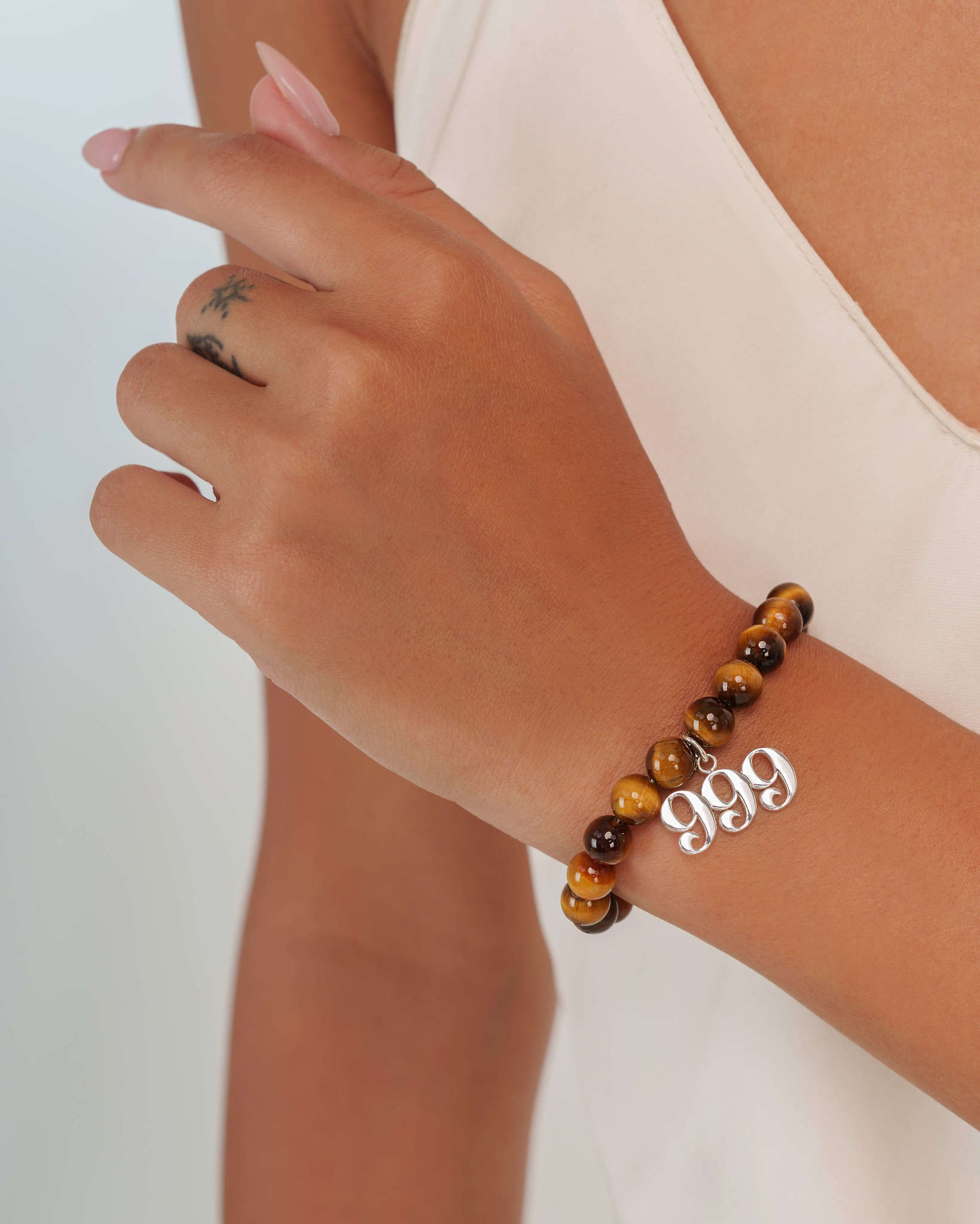 999 Tiger's Eye Silver Charm Bracelet