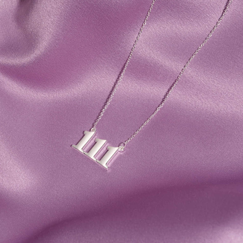 silver 111 necklace on silk