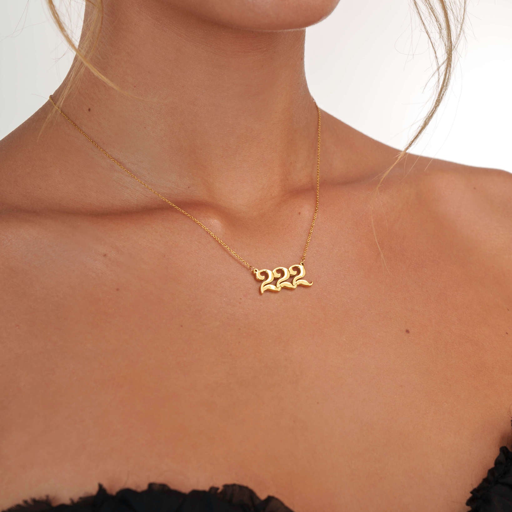 222 gold necklace with unique design