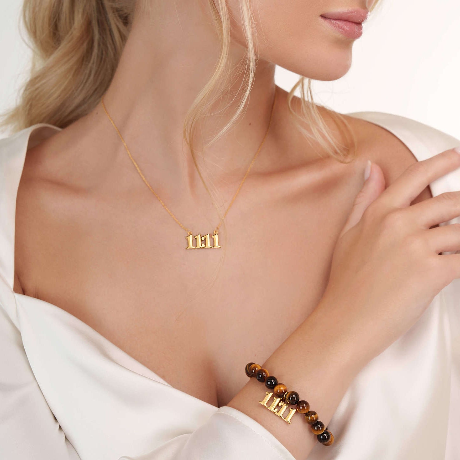 Model wearing an Tigers Eye 11:11 Gold bracelet with a matching 11:11 Gold necklace
