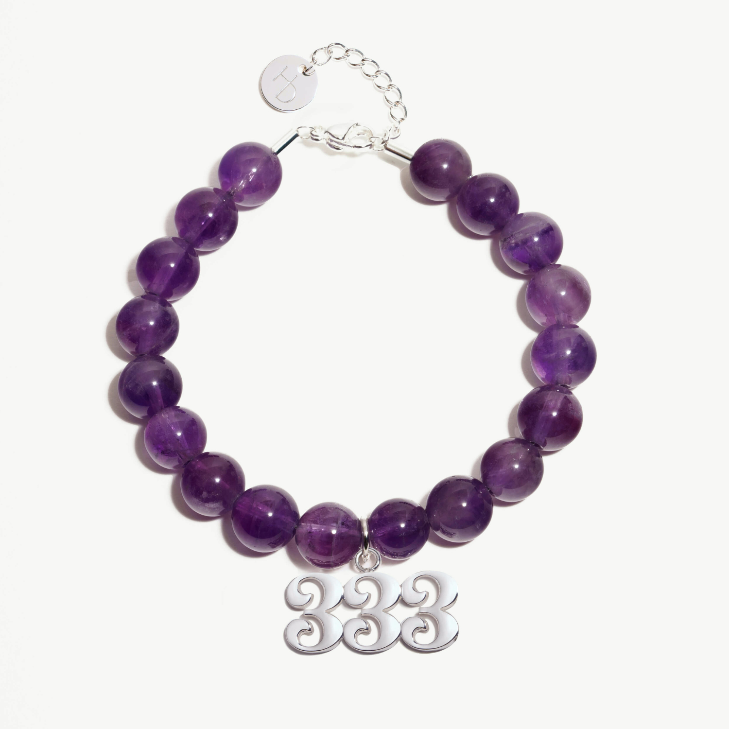 333 Amethyst beaded bracelet with adjustable clasp closure. 333 Silver Charm