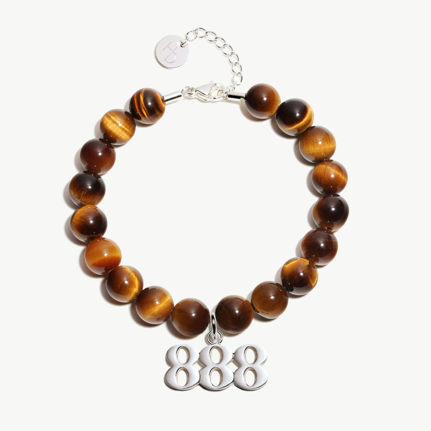 888 Tigers Eye beaded bracelet with adjustable clasp closure. 888 Silver Charm
