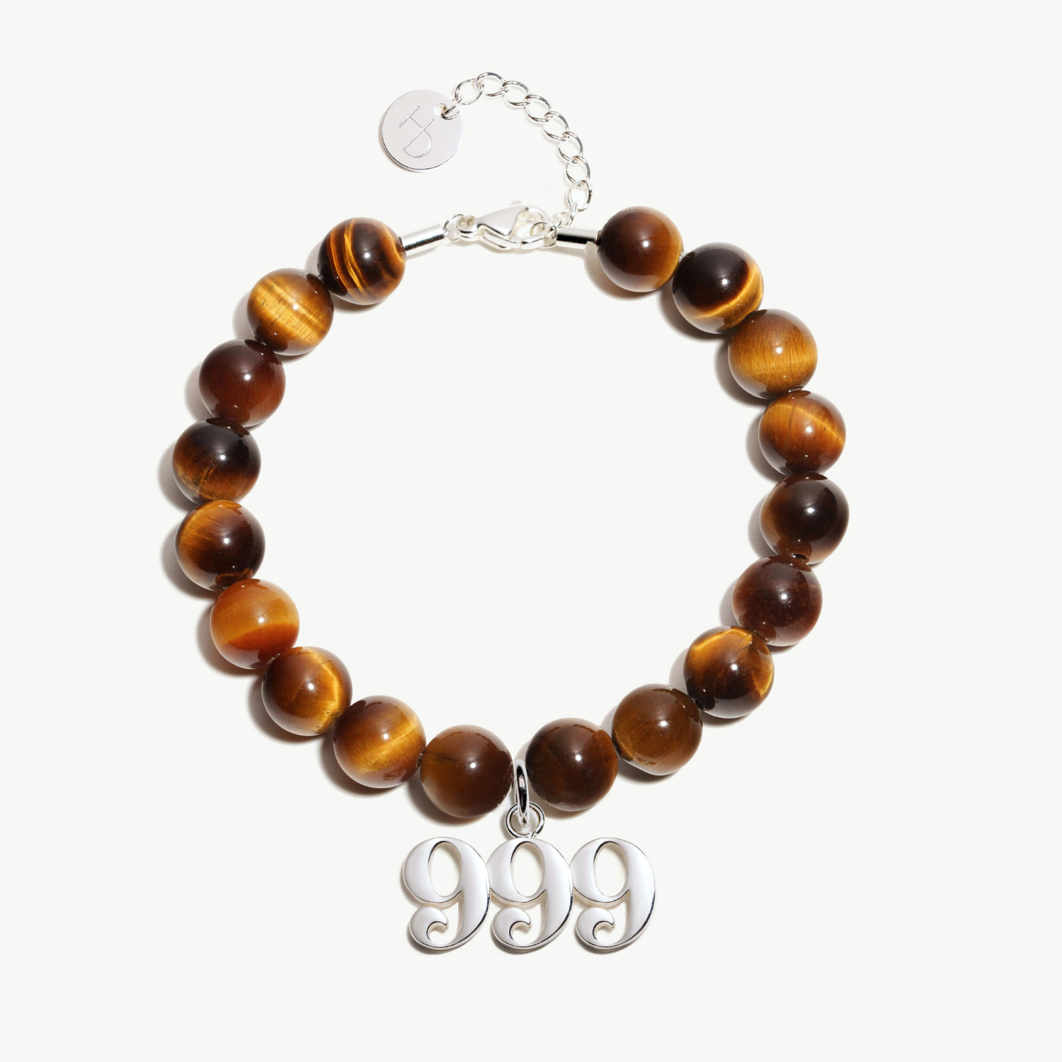 999 Tigers Eye beaded bracelet with adjustable clasp closure. 999 Silver Charm

